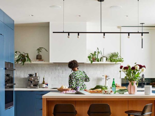 Bright modern kitchen with a Sonos speaker on the counter for whole-home audio