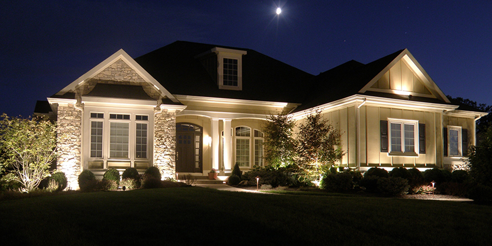 Florida house with exterior lighting on
