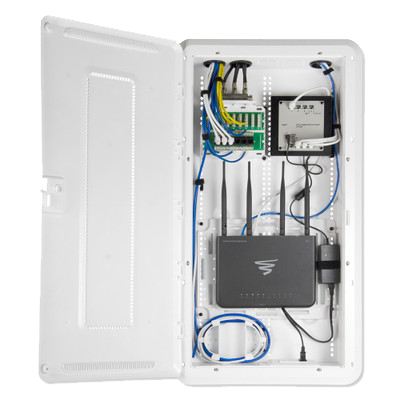 large white enclosure box with lots of wires running in it